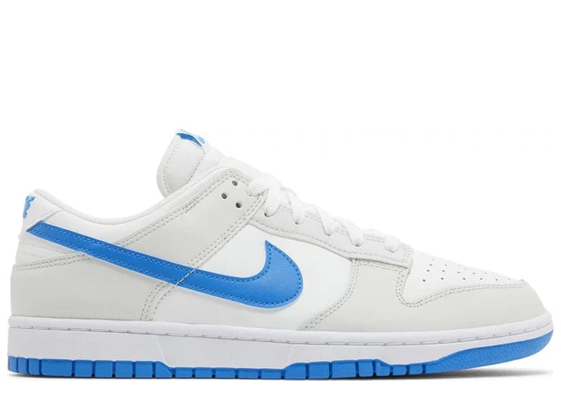 white nikes with blue tick