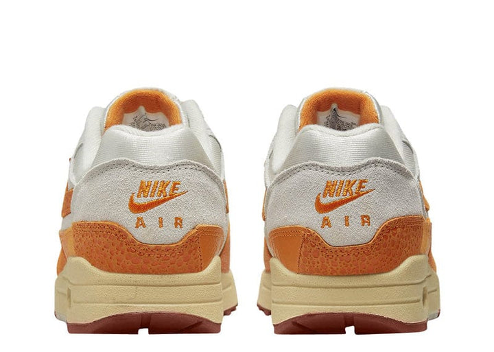 Orange and black nike air best sale